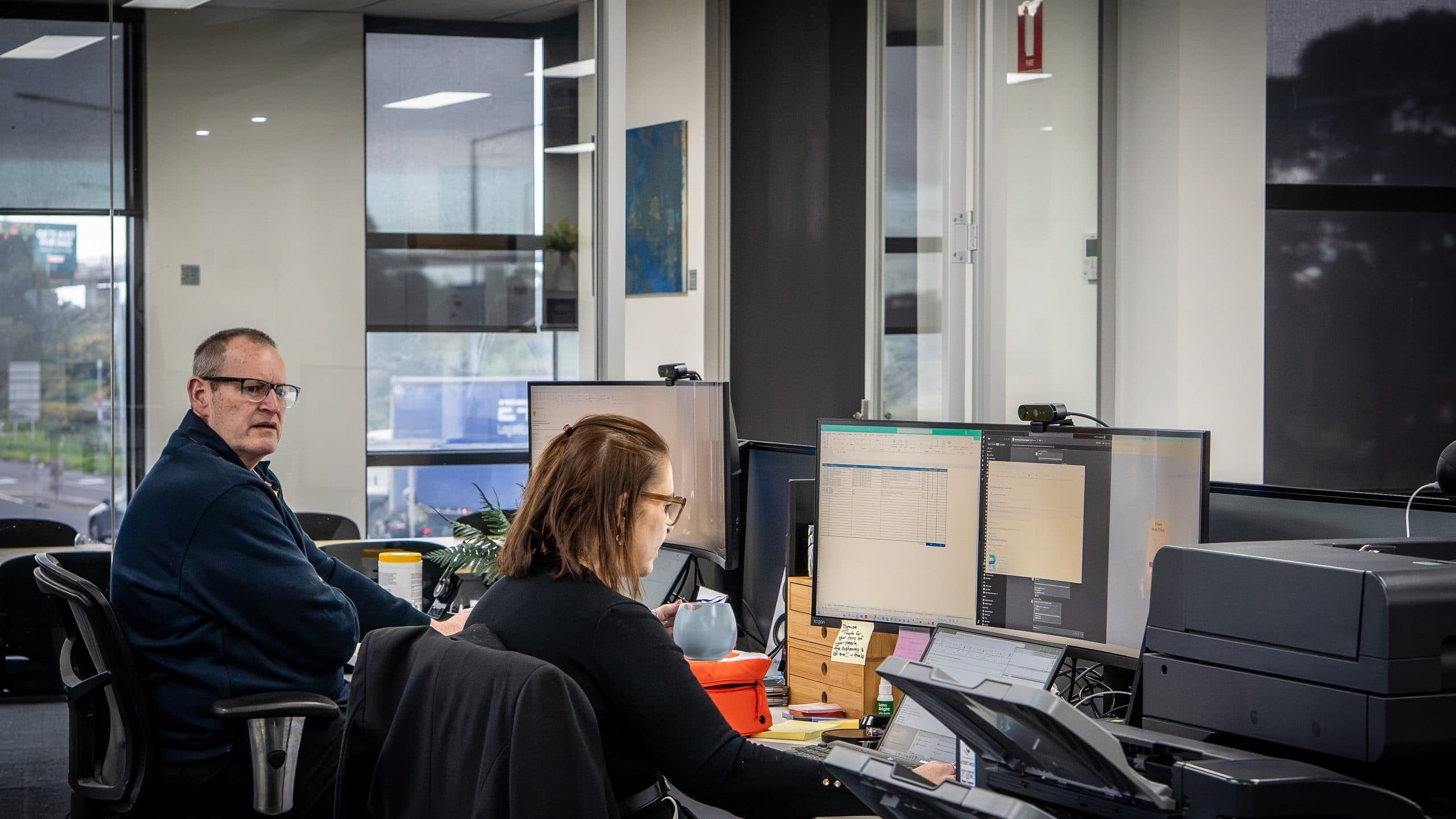 The SCCS team at work on the Port Melbourne office floor